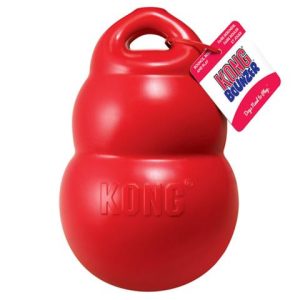 Hračka Kong Dog Bounzer Gran&aacute;t s &uacute;chytom, aportovac&iacute;, červen&yacute;, guma, L